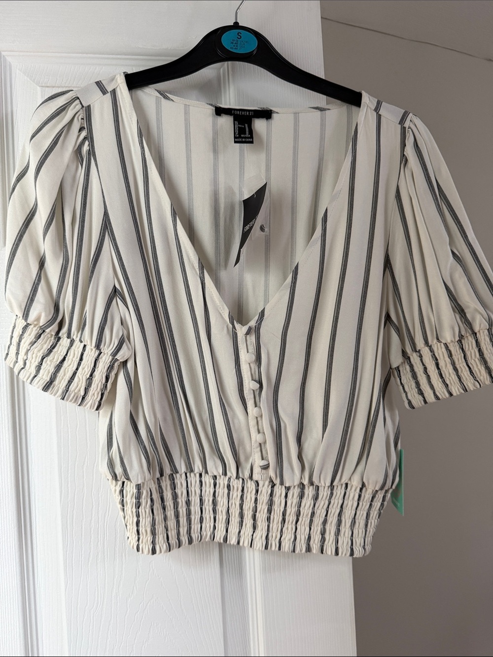 Cream and Black Vertical Stripe V-Neck Smocked Crop Top